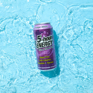 individual can of 5-hour ENERGY Grape Blast in water