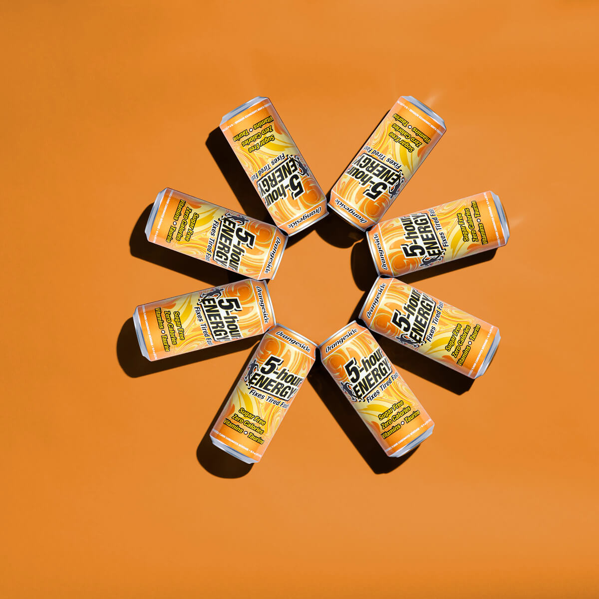 8 cans of 5-hour ENERGY Orangesicle in the shape of a circle