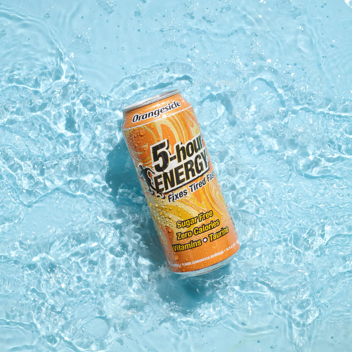 Individual can of 5-hour ENERGY Orangesicle in water