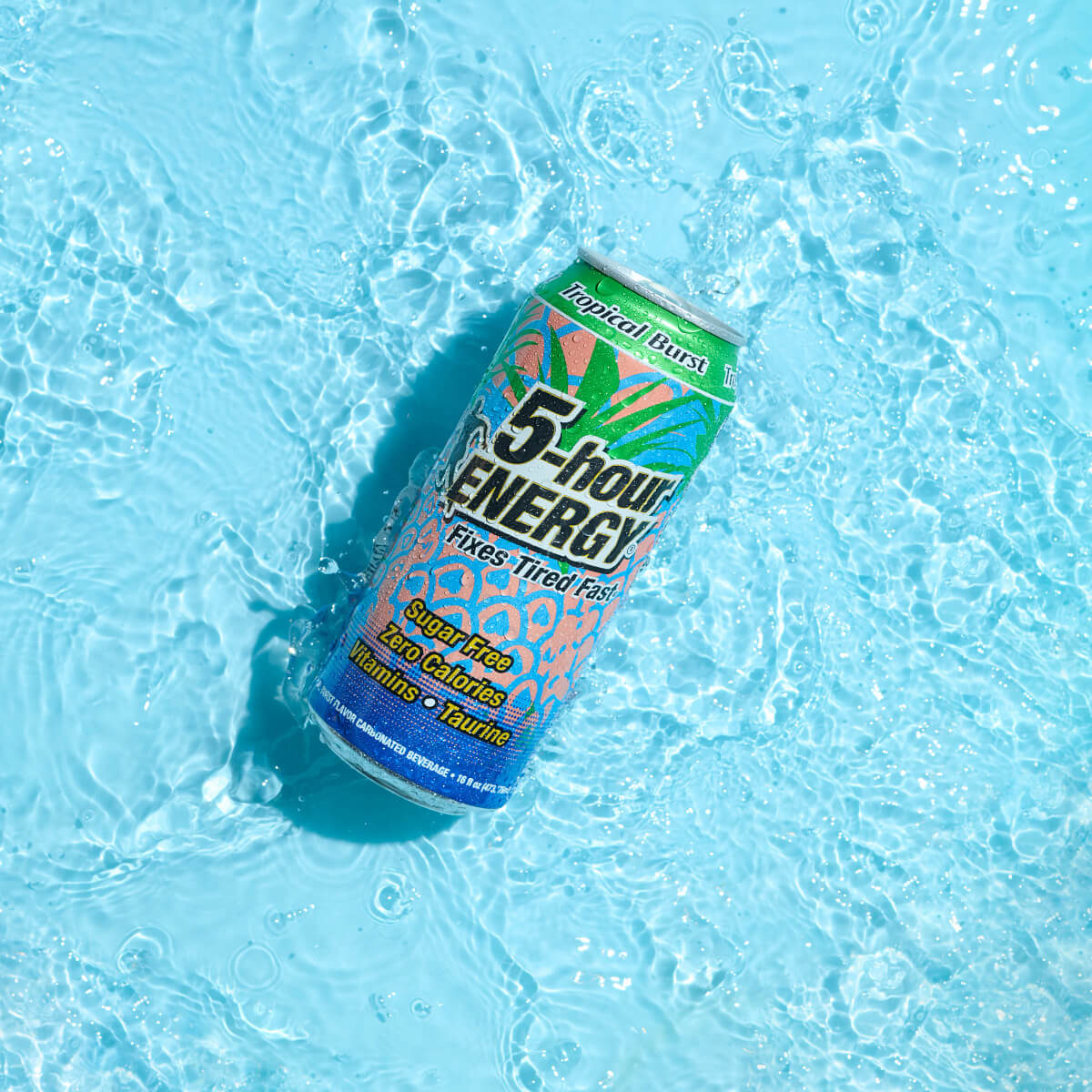 Individual can of 5-hour ENERGY Tropical Burst in water