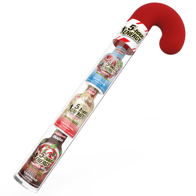 A novelty candy cane-shaped container made of clear plastic, holding four bottles of 5-Hour Energy drink in assorted flavors, with a red curved top and white striped label.