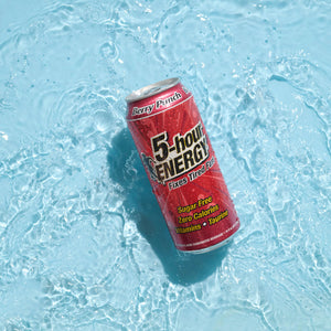 Individual can of 5-hour ENERGY Berry Punch laying in water