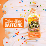 5-hour ENERGY Birthday Cake flavor energy drink bottle with colorful sprinkles on a cake background