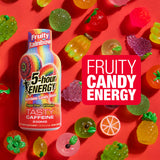 5-hour ENERGY Fruity Rainbow bottle surrounded by colorful candy on a red background