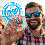 Man holding a 5-hour ENERGY Zero Sugar drink with a scenic background