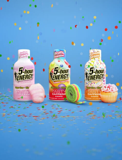 Three 5-hour Energy drinks with colorful packaging on a blue background with confetti.