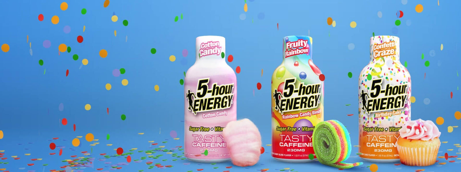 Three bottles of 5-hour Energy drinks with colorful confetti on a blue background