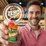 A smiling man in a pink shirt holds up a bottle of 5-hour Energy watermelon flavor. A large circular graphic overlay on the left reads 'ZERO Sugar' with a small watermelon icon.