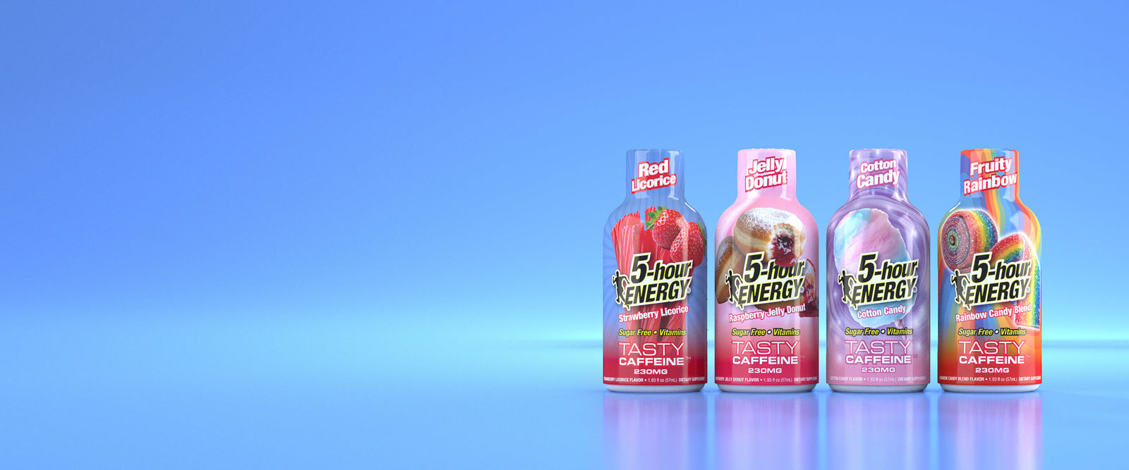Four bottles of Tasty Energy drink arranged in a row on a reflective blue surface against a blue gradient background. The bottles are labeled with different flavor graphics including strawberry, chocolate, and citrus, and feature the brand name 'Tasty Energy'.